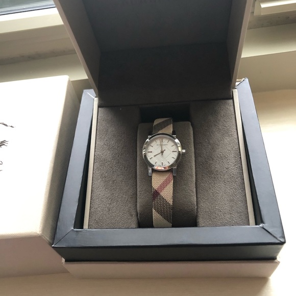 Burberry Accessories - XMAS SALE Silver Burberry round canvas!!!